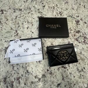 CHANEL Black Quilted Card Holder with Gold Logo